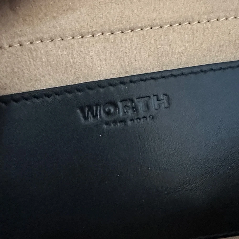 Worth NY long and skinny plum Clutch Wristlet